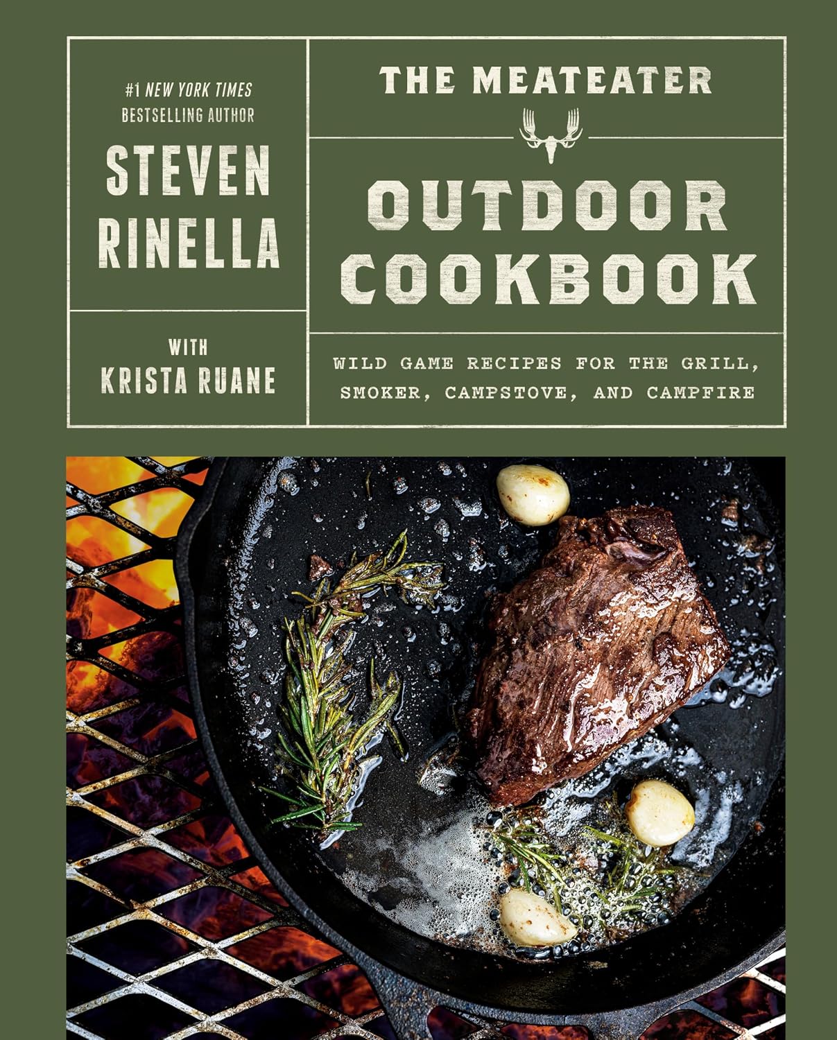 Front cover of The Meateater Outdoor Cookbook by Steven Rinella with Krista Ruane, featuring a dark olive green background with white title text and a large food photograph of a steak cooking in a cast iron skillet.