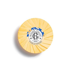 Yellow soap bar in scent Vanille Soleil with Roger & Gallet branding on a white background. 