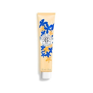 Tube of Roger & Gallet Vanille Soleil hand cream with floral design on a white background.