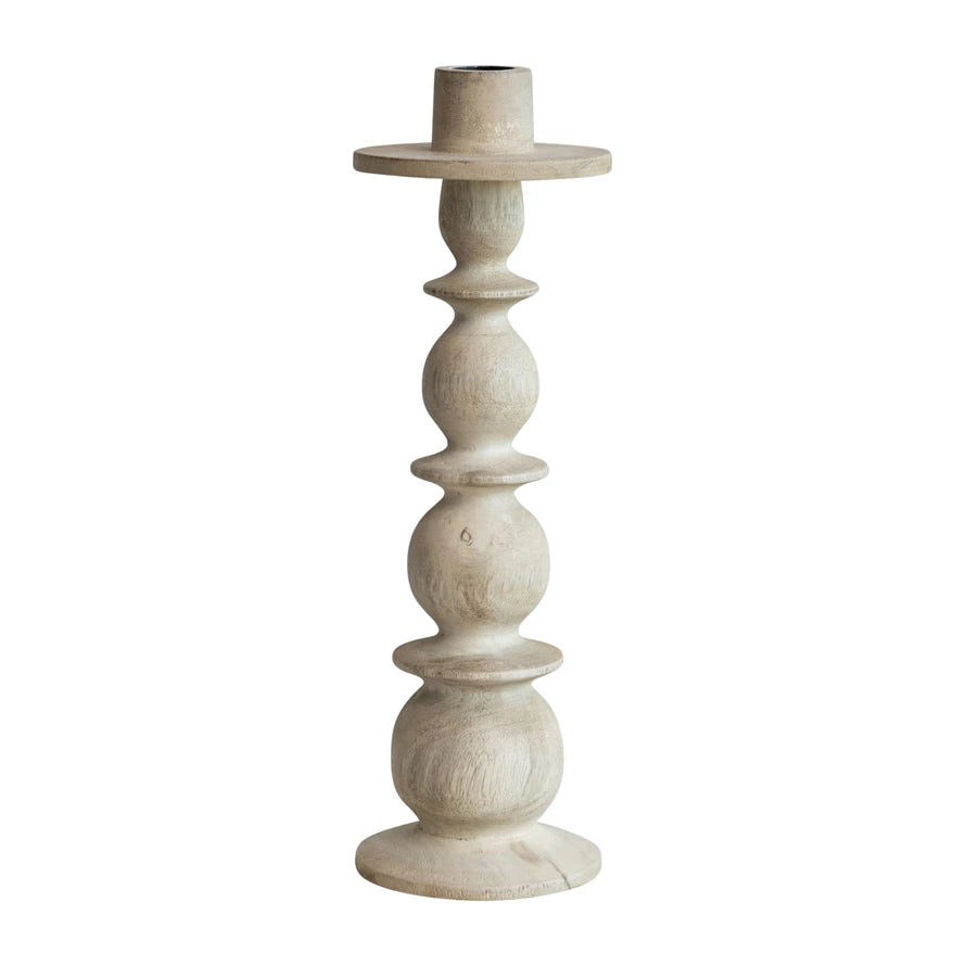Individual hand carved mango wood taper candle holder in whitewashed color. Twelve inches in height. 