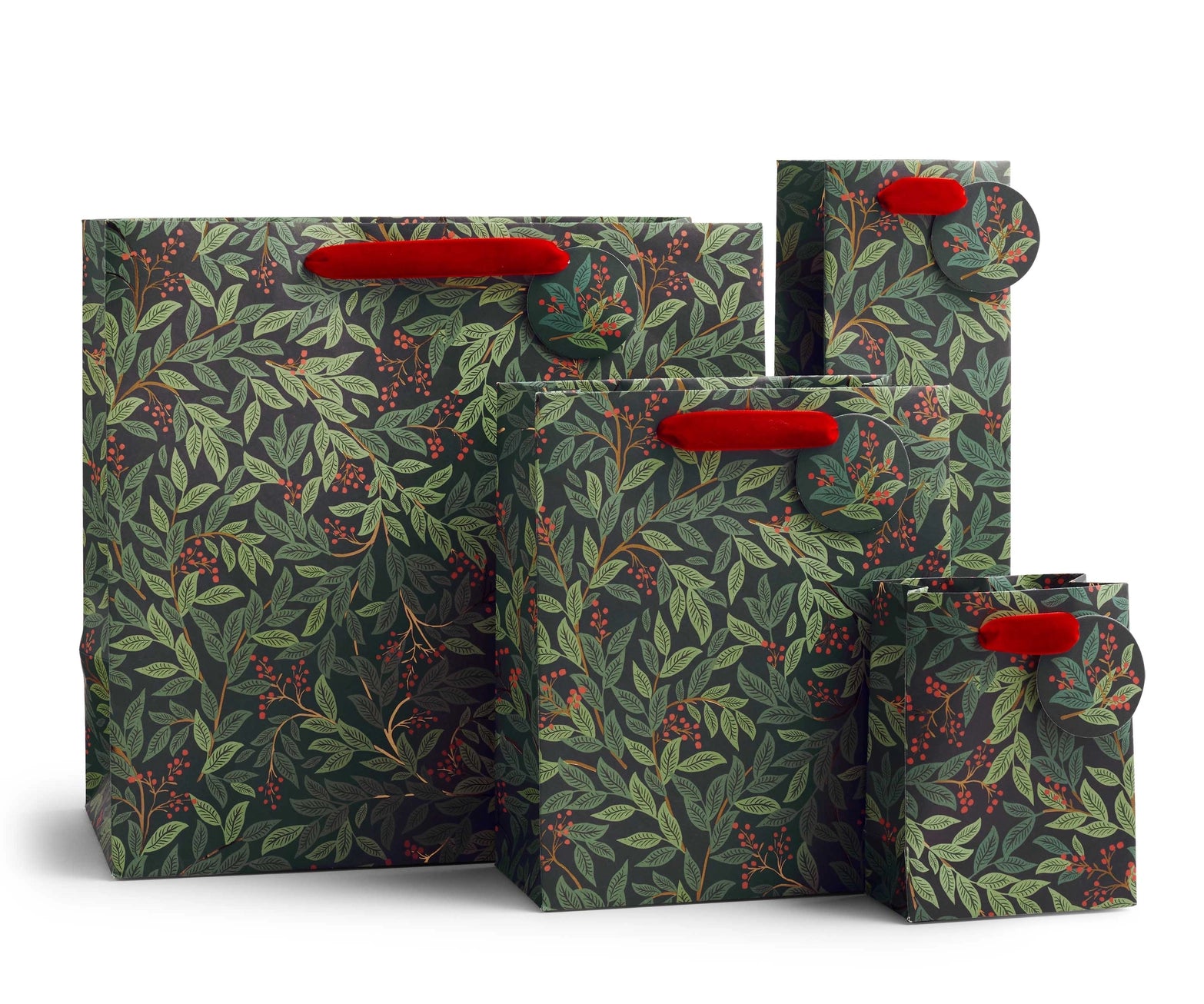 Willowberry red and green holiday gift bags in various sizes. Rifle Paper Co. Red velvet handle and ties. 