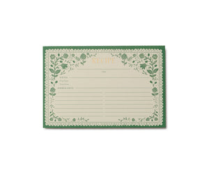 Recipe card with green floral artichoke border on a white background. 