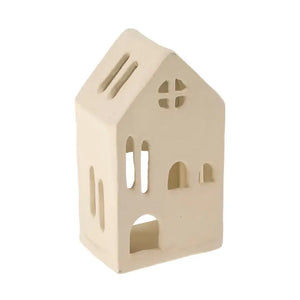 A small house-shaped metal candle holder in a warm cream or off-white color, shown against a plain white background.