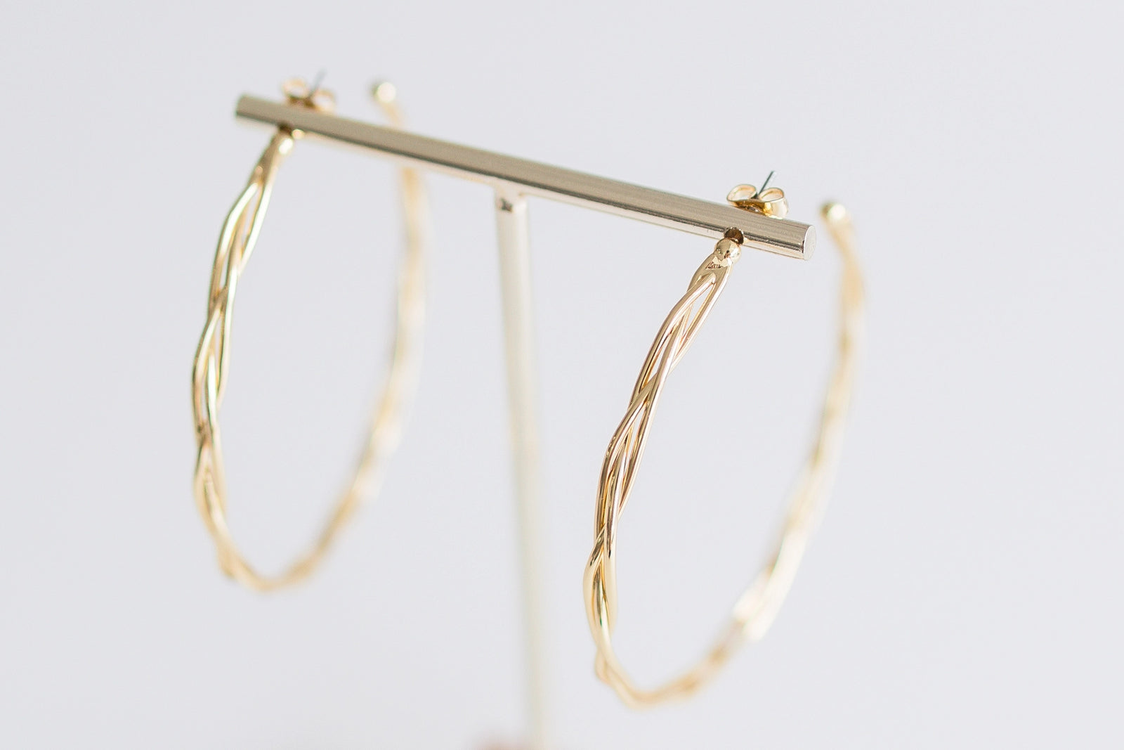 Two inch braided gold hoop earrings. Leslie Curtis jewelry. 