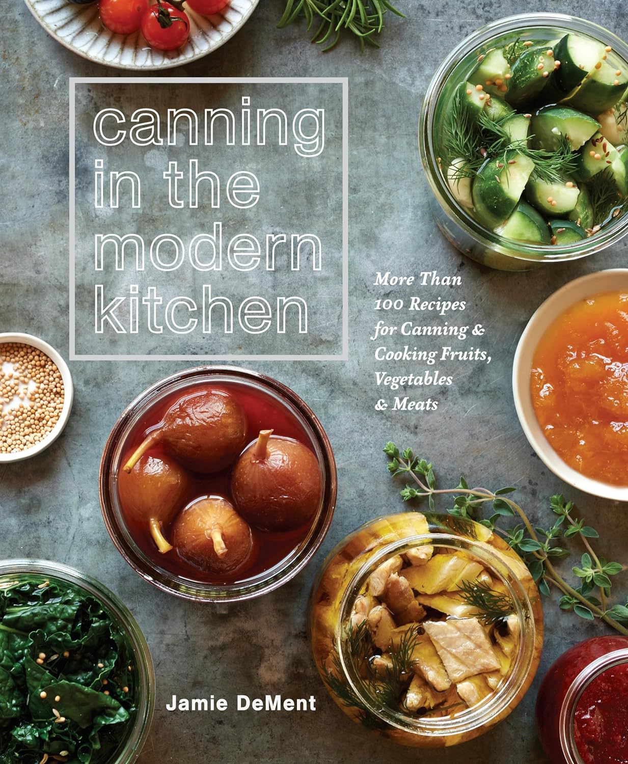 Front cover of cookbook Canning in the Modern Kitchen with clear jars of various canned fruits and vegetables. 