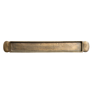 Top view of cast aluminum antique brass tray with handle. 