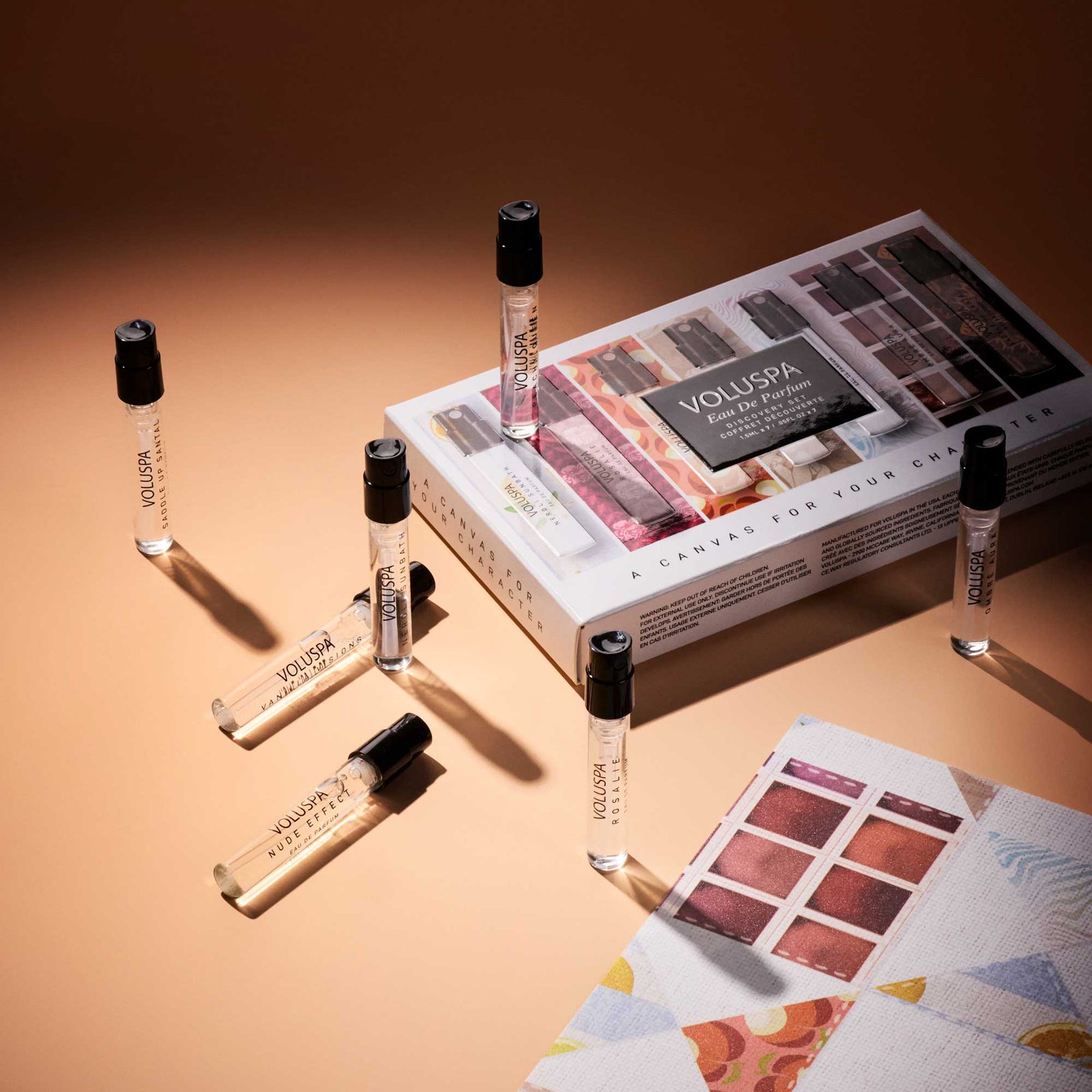 Collection of seven discovery eau de parfums from Voluspa. 