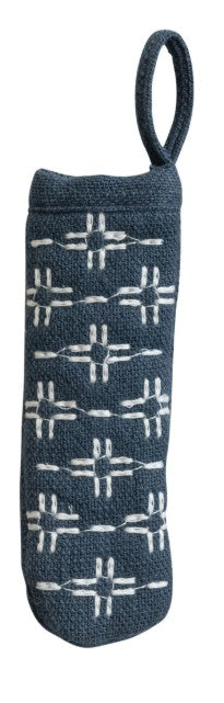 A dark blue woven fabric pot handle holder with a white geometric pattern and a hanging loop at the top, shown against a plain white background.