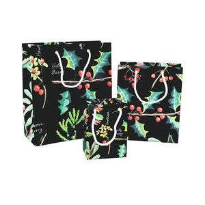 Holly and berries on a black background gift bags of three sizes