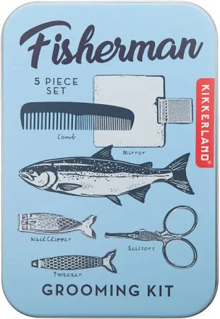 Kikkerland Fisherman grooming kit with comb, mirror, nail clippers, scissors, and tweezers on a blue background.