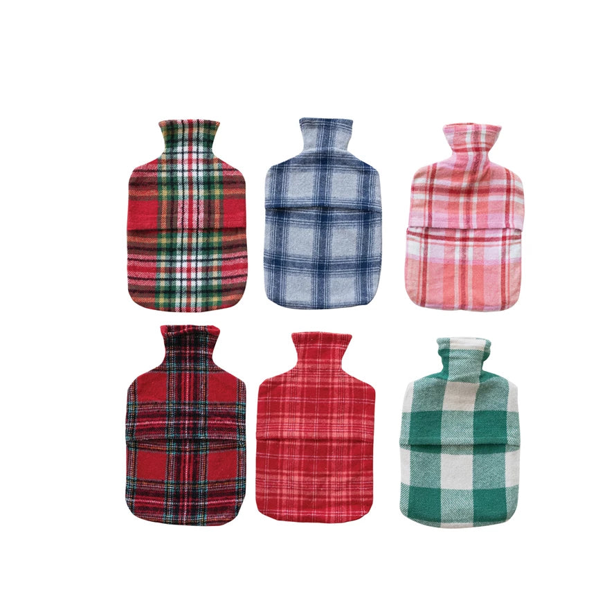Set of six plaid flannel hot water bottles on a white background. 