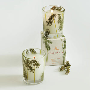 2 oz Frasier Fir holiday candle. Green and gold pine needle glass jar design. Thymes. 