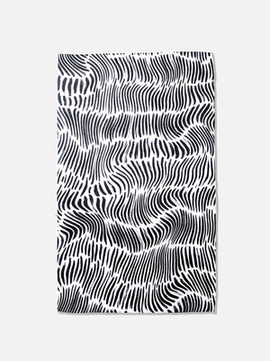 Black and white patterned Geometry towel on a white background