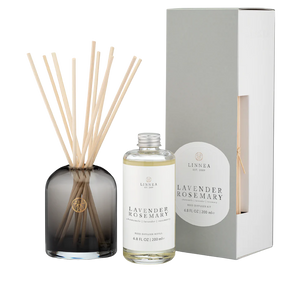 Lavender Rosemary diffuser set with bottle, sticks, and packaging on a white background