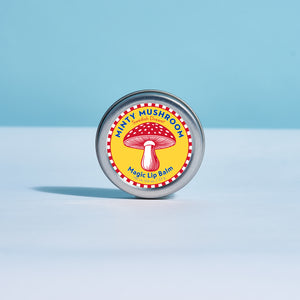 Minty Mushroom Magic Lip Balm tin on a light blue background