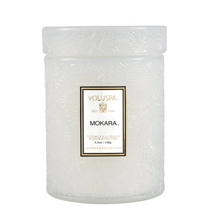 5.5 ounce Mokara Orchid Voluspa candle. 
