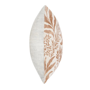 Side profile view of decorative lumbar pillow. Solid beige colored back cover, patterned chestnut brown front cover. 