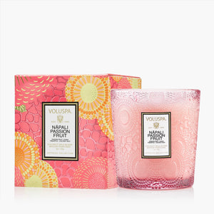 Voluspa Nápaló Passion Fruit nine ounce candle and packaging on a white background. 