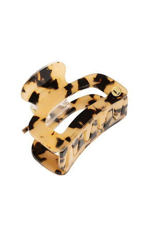 Ivory Tortoiseshell patterned hair clip on a white background