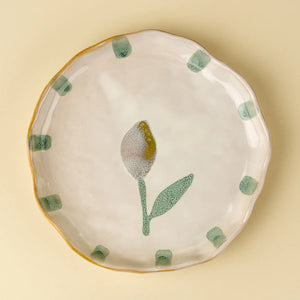 Hand painted stoneware plate with floral and lemon design on a beige background. Cottagecore. 