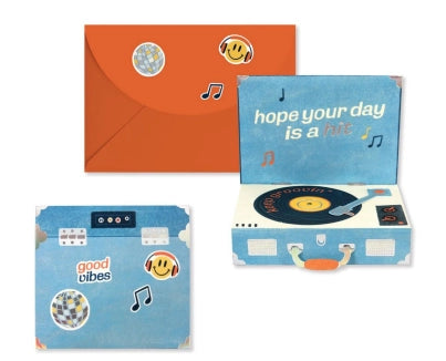 Set of colorful stationery items including an orange envelope, blue card with text, and a blue stationery set with record player design.