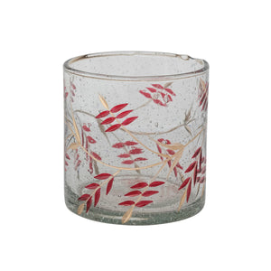 handmade seeded glass round candle votive with red and gold leaf painted design. 
