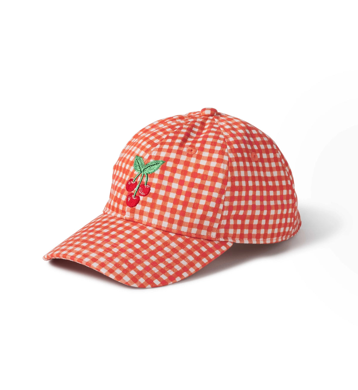 Red and white checkered cap with cherry design on a white background