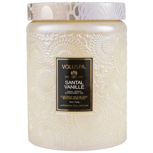 18 ounce cream colored glass jar candle in scent Santal Vanille from Voluspa. 