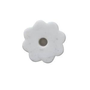 top view of white marble scalloped taper candle holder. 