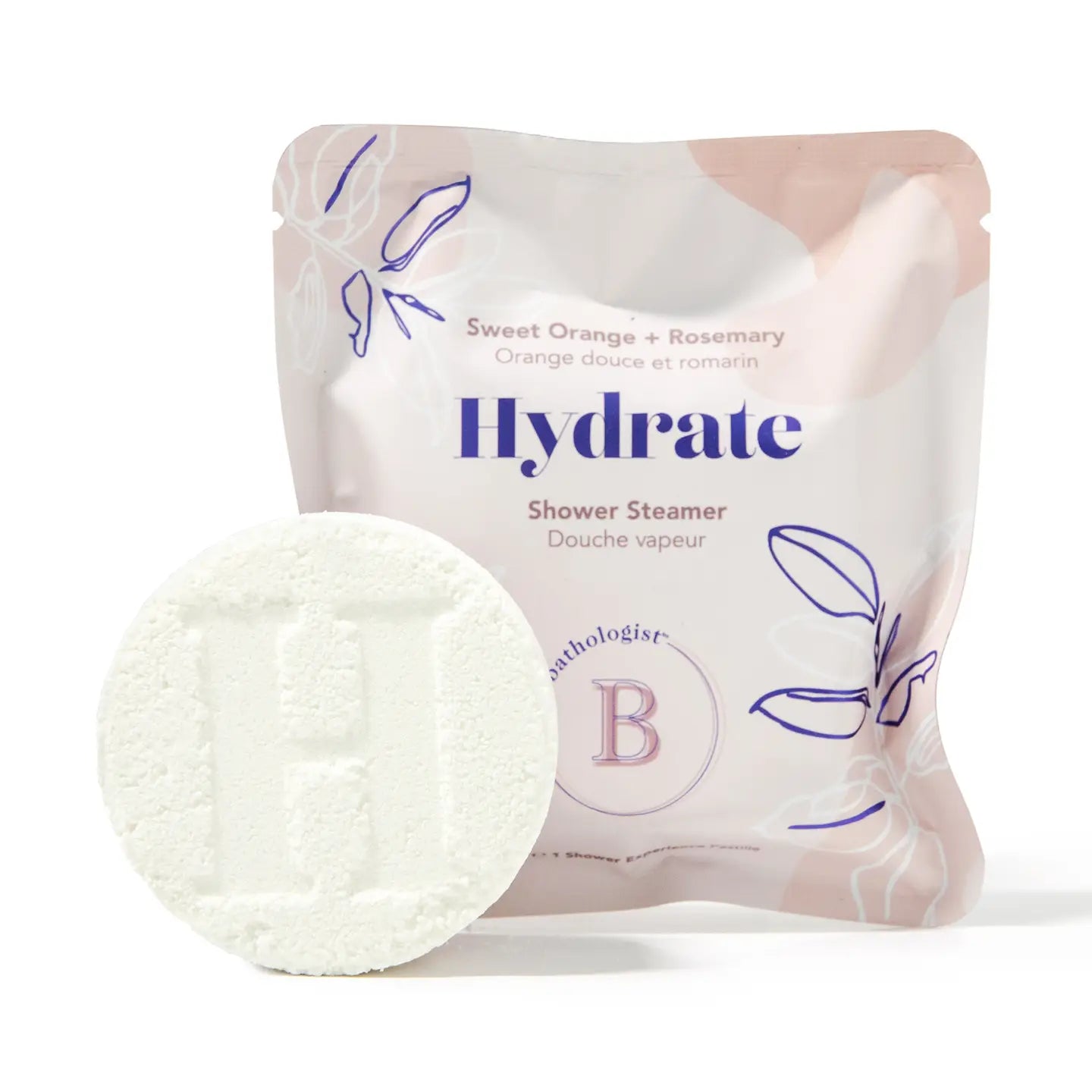 pink plastic bag featuring "hydrate shower steamer" with a white circular shower steamer in front on a white background.