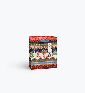 gift bags featuring a seater-inspired ski scene, with blue velvet handles and snowmen hang tags.