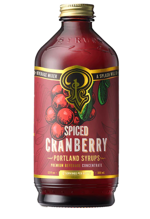 Spiced Cranberry syrup bottle with red label on white background