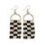 Gold accented black and white checkered beaded dangle earring