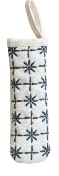 A white fabric pot handle holder with a hanging loop and a navy blue grid and starburst pattern, shown against a plain white background.