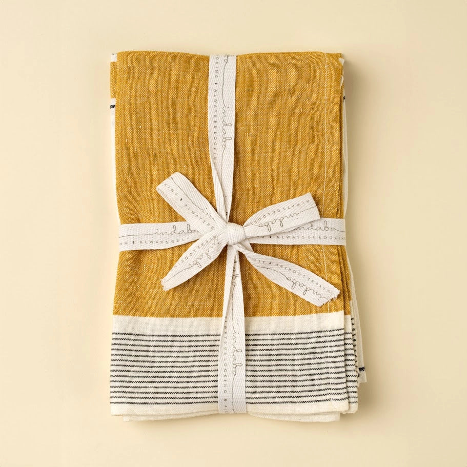 Two mustard yellow linen striped tea towels in a set of two.