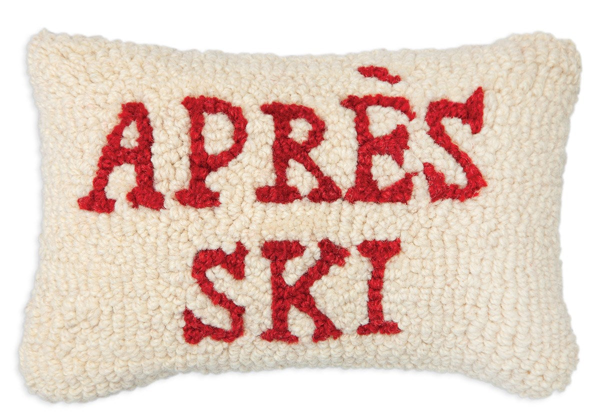 Cream colored 8x12 wool lumbar pillow with red lettering that reads "Apres Ski". Chandler 4 Corner
