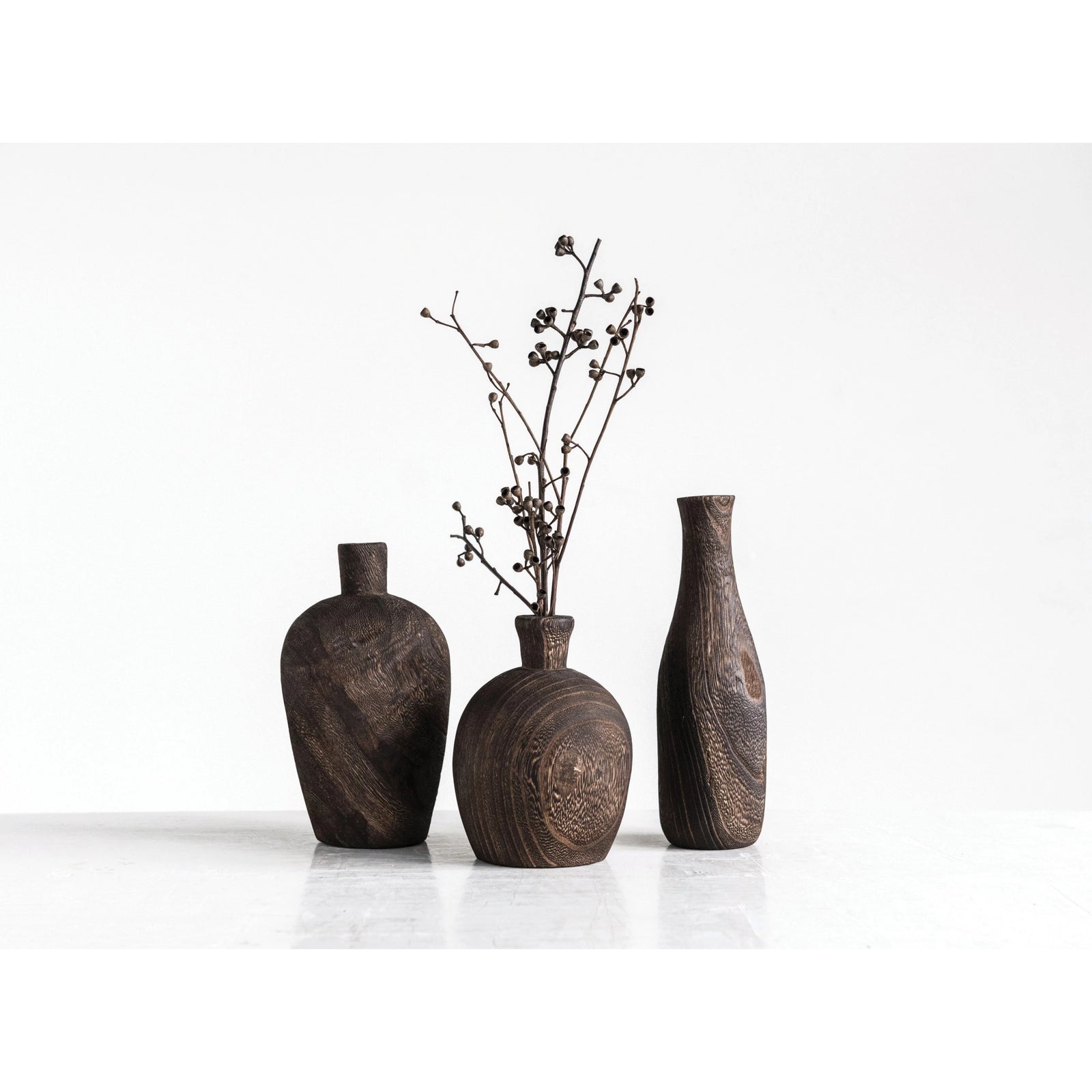 Dark walnut Paulownia wood vases in varying sizes and shapes. Perfect for faux or real floral stems. Home decor. Modern and rustic home decor. Shelf styling decor. 